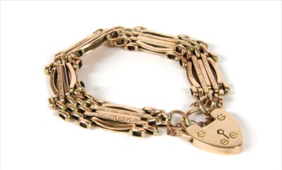 Lot 11 - A 9ct gold five row gate bracelet