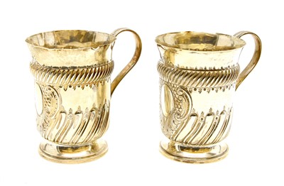 Lot 412 - A pair of Edwardian silver tankards