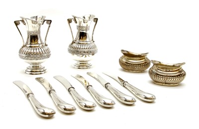 Lot 350 - A pair of Edwardian silver twin handled miniature pourers