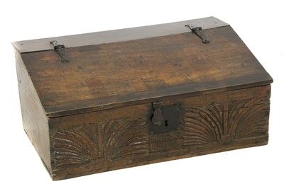 Lot 738A - An 18th century and later carved oak bible box