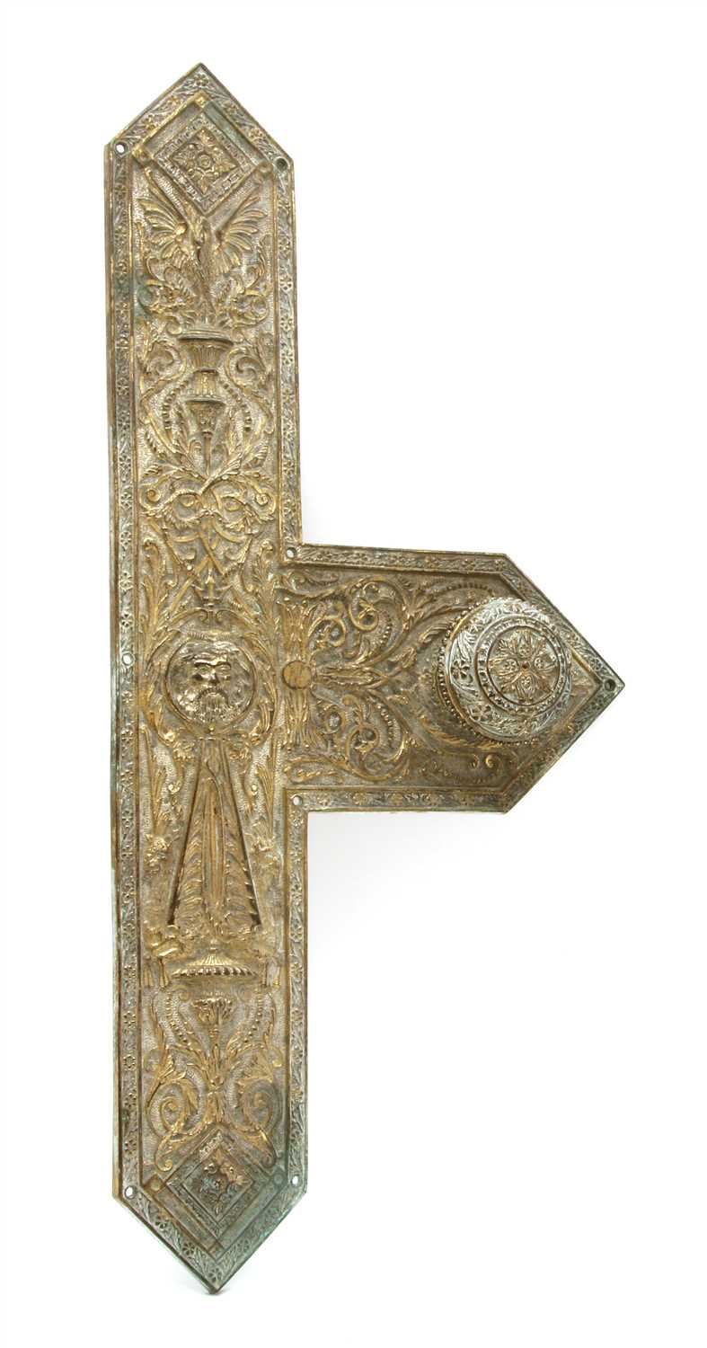 Lot 355 - A 19th century large decorative cast brass door plate and knob