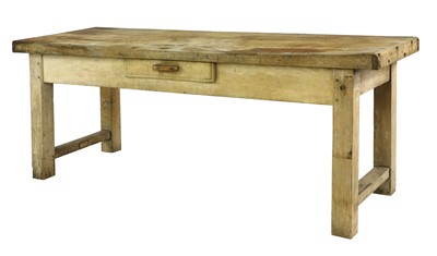 Lot 898 - A Continental beech butcher's block table