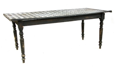 Lot 688 - A 19th century ebonised pine table