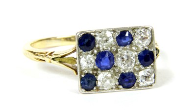 Lot 331 - A gold, sapphire and diamond three row cluster ring