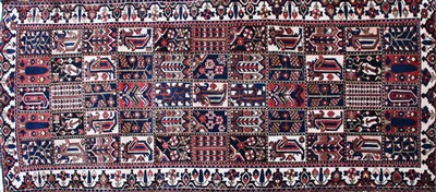 Lot 691 - Two ivory ground Caucasian rugs