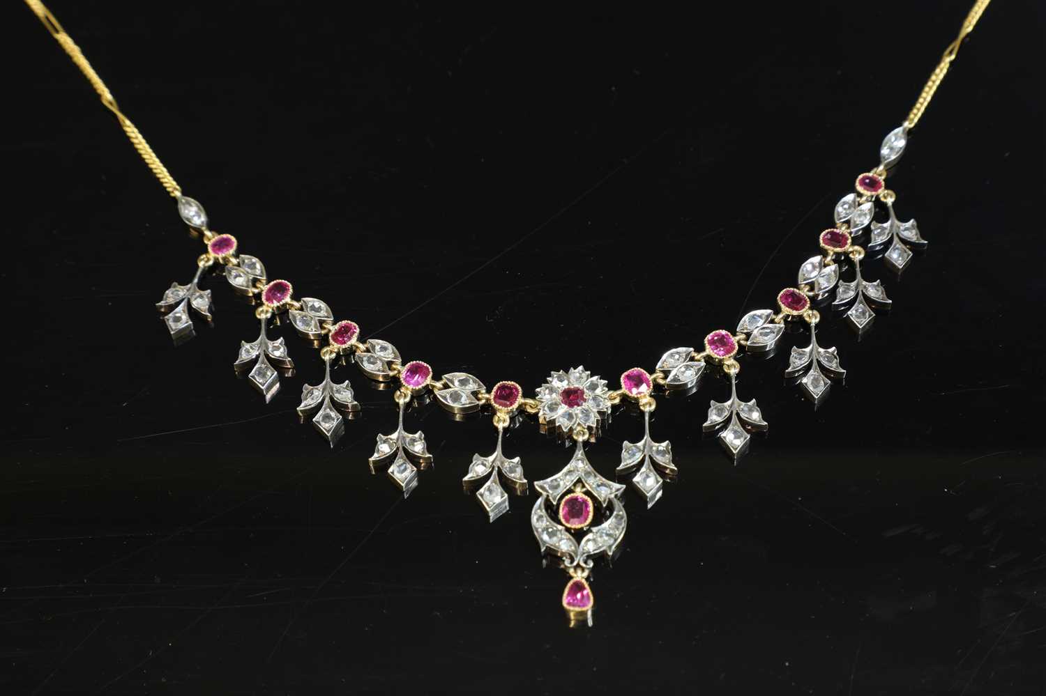 Lot 61 - A cased Anglo-Indian ruby and diamond fringe necklace, c.1900