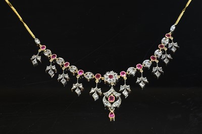 Lot 61 - A cased Anglo-Indian ruby and diamond fringe necklace, c.1900