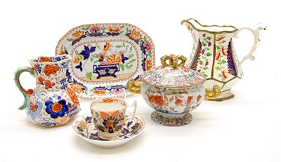 Lot 475 - A mixed lot of 19th century ironstone pieces to include a pair of lidded tureens