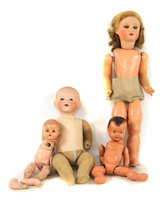 Lot 515 - A collection of toy dolls