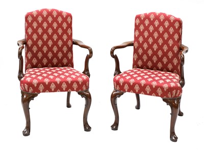Lot 438 - A pair of reproduction mahogany elbow chairs