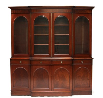 Lot 701 - A reproduction mahogany breakfront bookcase