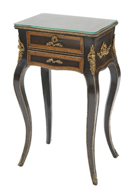Lot 919 - A French inlaid and ebonised lamp table