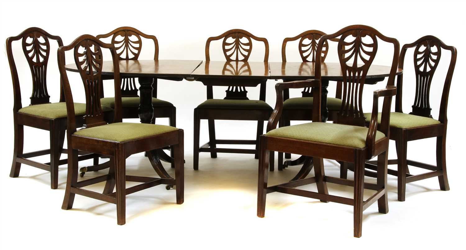 Lot 442 - A 19th century mahogany twin pillar dining table