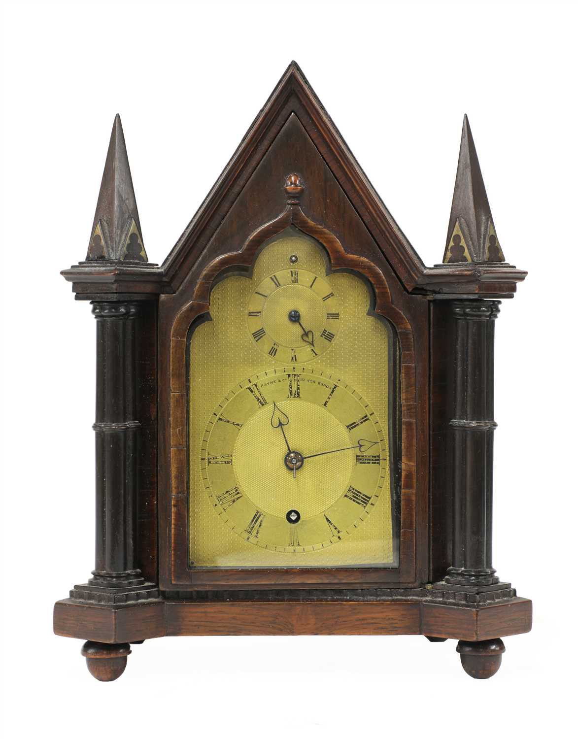Lot 664 - A Gothic Revival rosewood mantel clock by Perry Webster