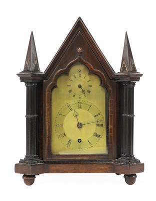 Lot 664 - A Gothic Revival rosewood mantel clock by Perry Webster
