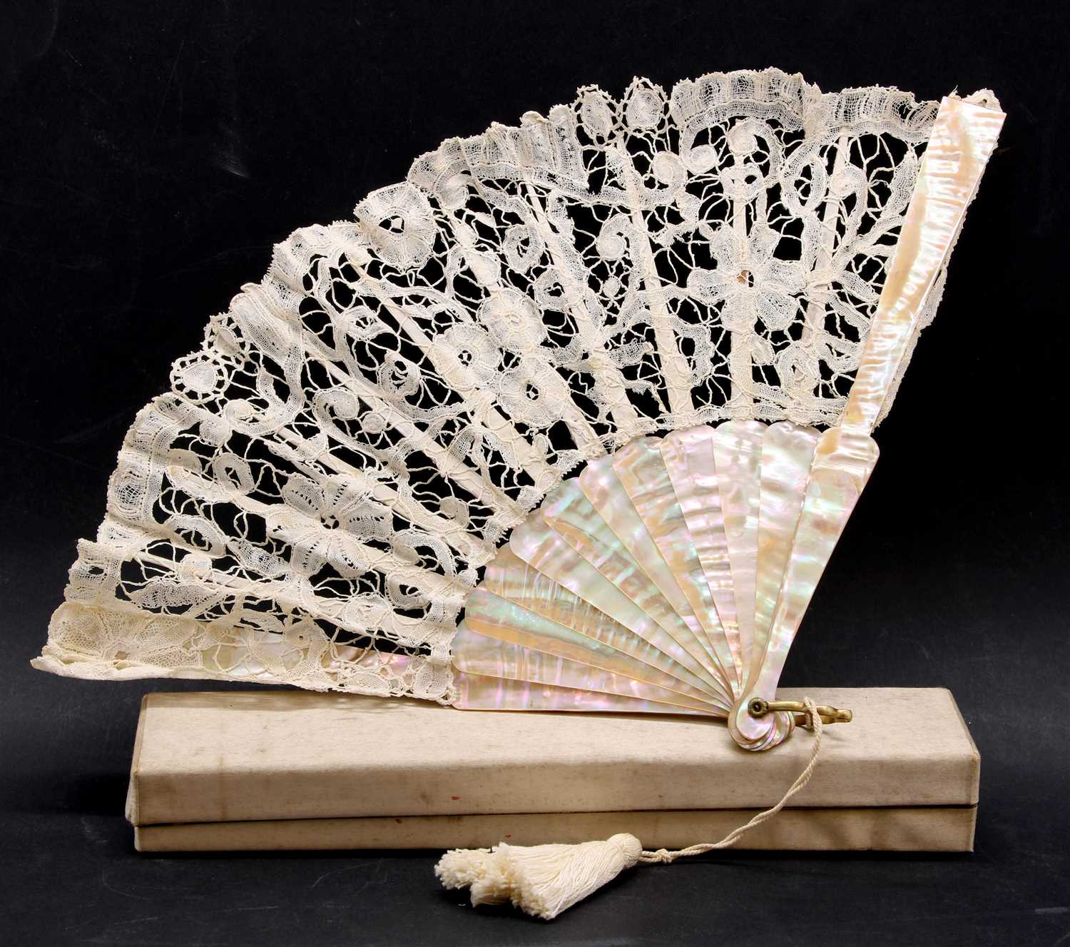 Lot 380 - A late 19th century to early 20th century mother of pearl fan