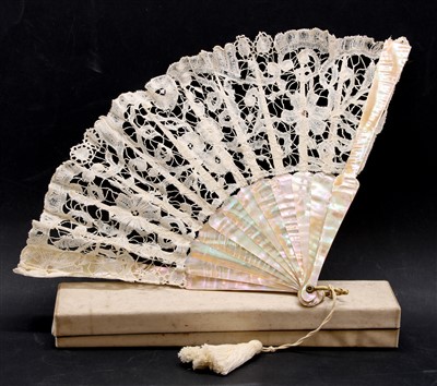 Lot 380 - A late 19th century to early 20th century mother of pearl fan