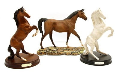 Lot 551 - Three Royal Doulton Connoisseur figures of horses