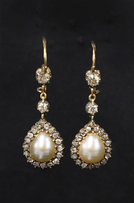 Lot 171 - A pair of Edwardian pearl and diamond drop earrings