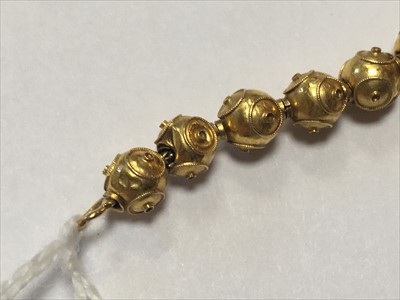 Lot 46 - A Victorian Etruscan Revival graduated gold bead necklace, c.1860