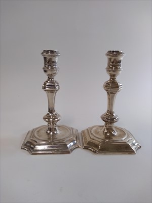 Lot 9 - A pair of George I Britannia standard silver candlesticks