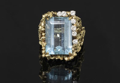 Lot 154 - An aquamarine and diamond cocktail ring, c.1970