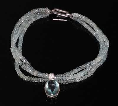 Lot 446 - A French white gold aquamarine and diamond torsade necklace