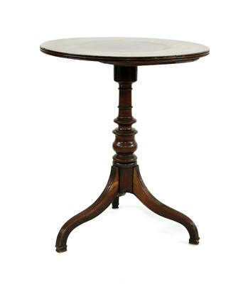 Lot 440 - A 19th century mahogany lamp table