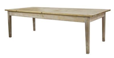 Lot 853 - A large stripped pine farmhouse table