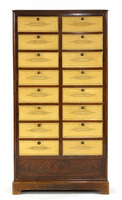 Lot 860 - A French mahogany chest of seventeen drawers