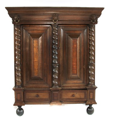 Lot 494 - A large Dutch oak cupboard