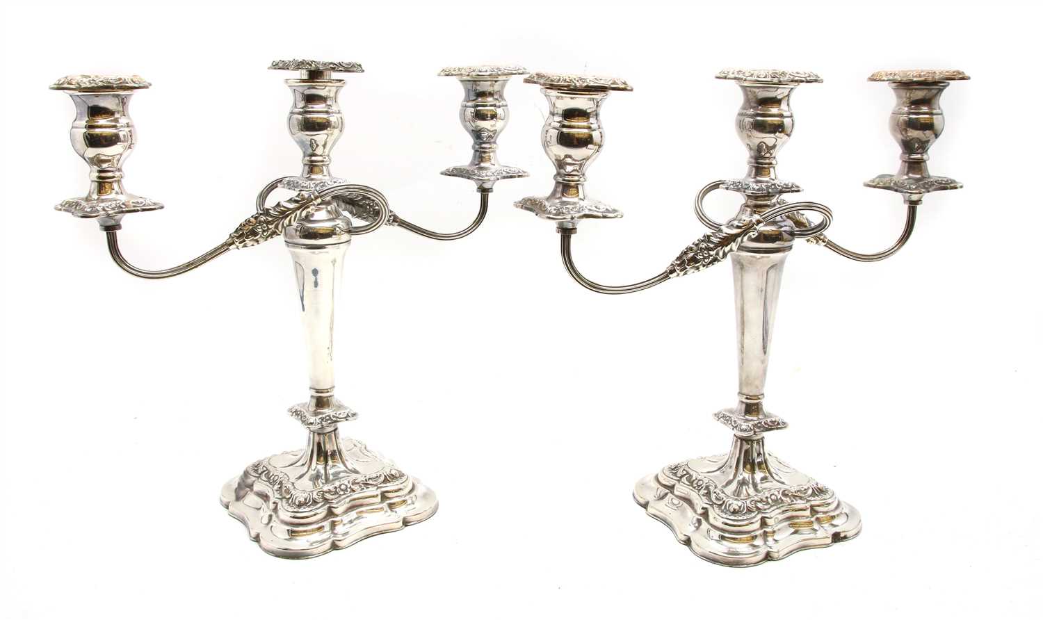 Lot 193 - A pair of silver plated three branch candelabra