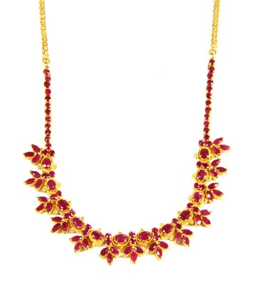 Lot 52 - A high carat gold ruby fringe centrepiece necklace