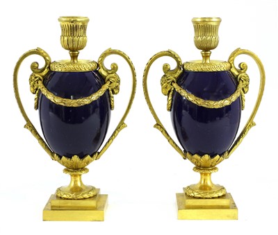 Lot 257 - A pair of gilt bronze and porcelain cassolettes