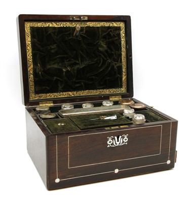 Lot 196 - A Victorian rosewood and mother-of-pearl inlaid toilet box