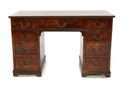 Lot 603 - An Edwardian walnut and crossbanded pedestal desk
