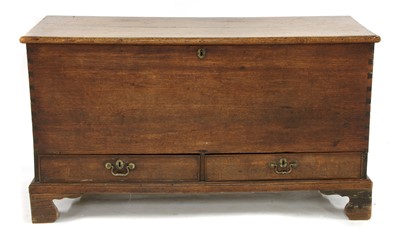 Lot 476 - A George III oak blanket box