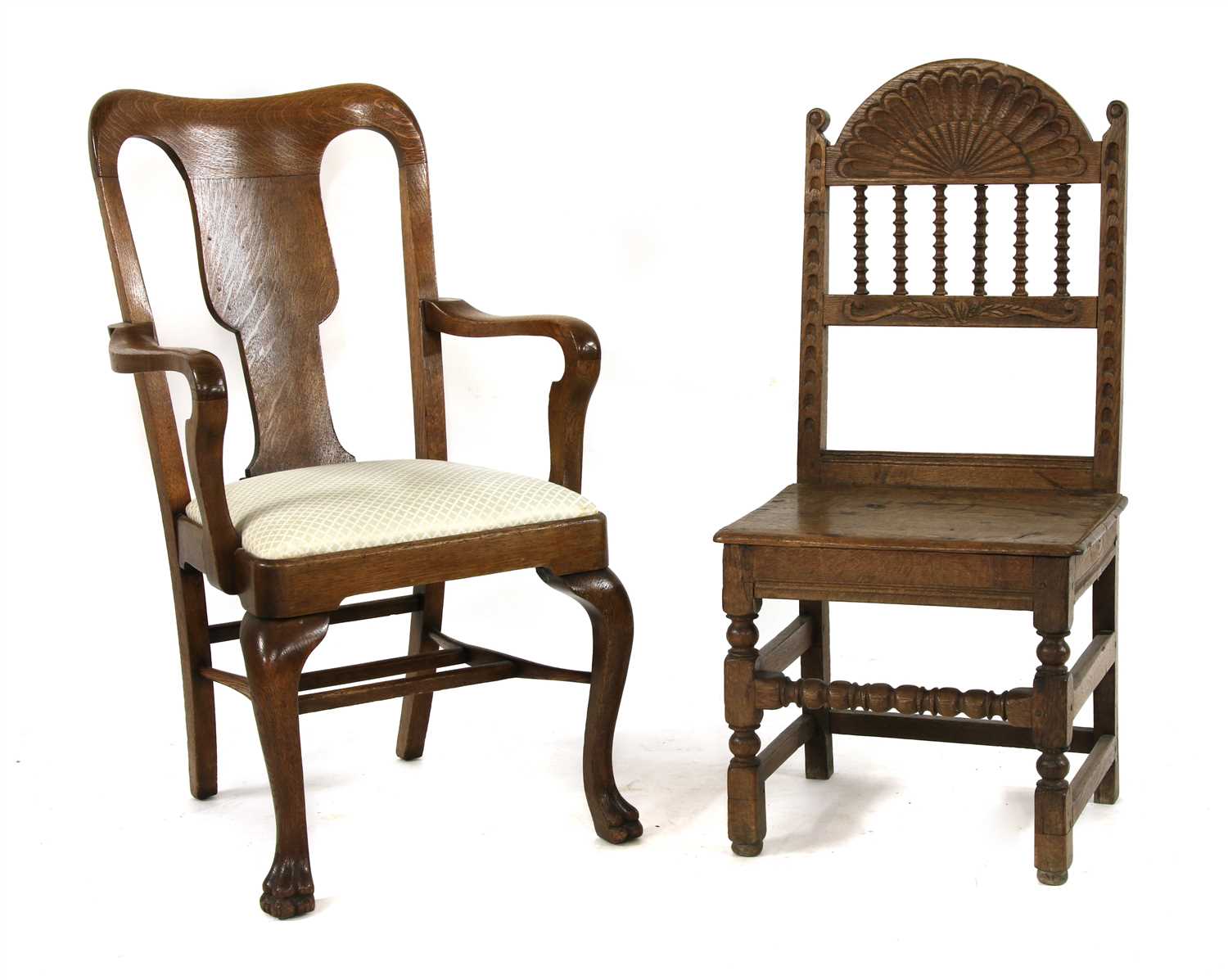 Lot 462 - A George II style oak armchair