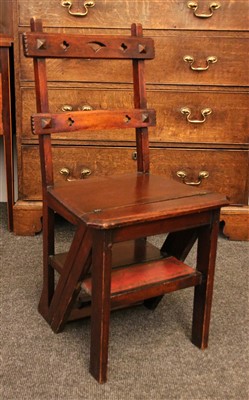 Lot 1610 - An Arts and Crafts mahogany metamorphic library chair/steps