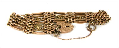 Lot 8 - A gold five row gate bracelet