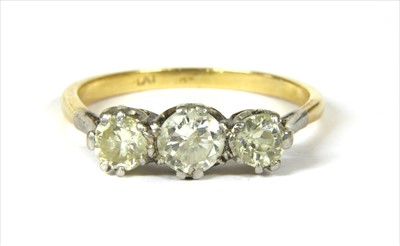 Lot 1 - A gold three stone diamond ring