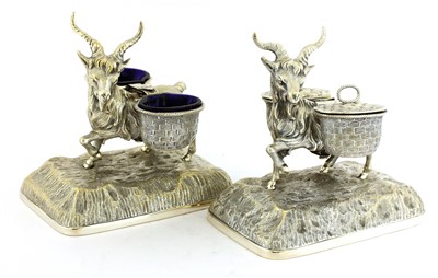 Lot 61 - A pair of silver-plated cruets in the form of goats