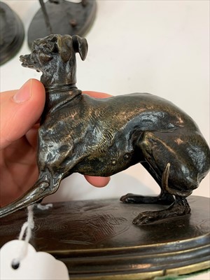 Lot 190 - A bronze model of a whippet with a ball