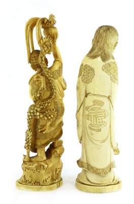Lot 133 - Two Japanese carved ivory figures
