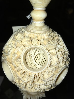 Lot 135 - A Chinese carved ivory puzzle ball