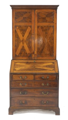 Lot 496 - A George III mahogany and yew bureau bookcase
