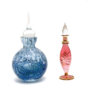 Lot 216 - A hand blown glass scent bottle of globular form