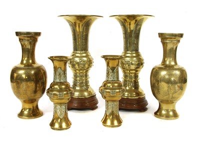 Lot 1367 - A pair of Chinese brass vases