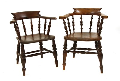 Lot 1737 - Two elm captain's chairs