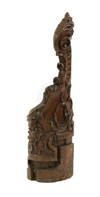 Lot 665 - A profusely carved oak pew end
